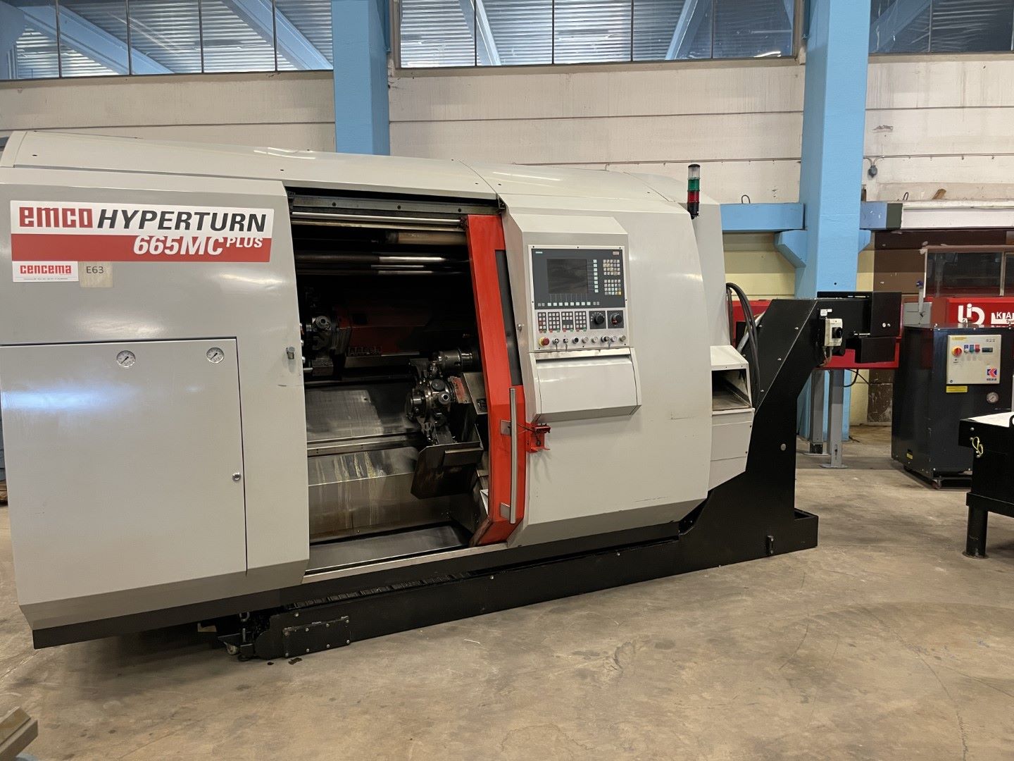 Tour CNC avec ravitailleur de barres EMCO HYPERTURN 665 MC PLUS d'occasion