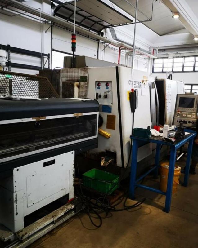 Tour CNC avec ravitailleur de barres GILDEMEISTER CTX420 d'occasion