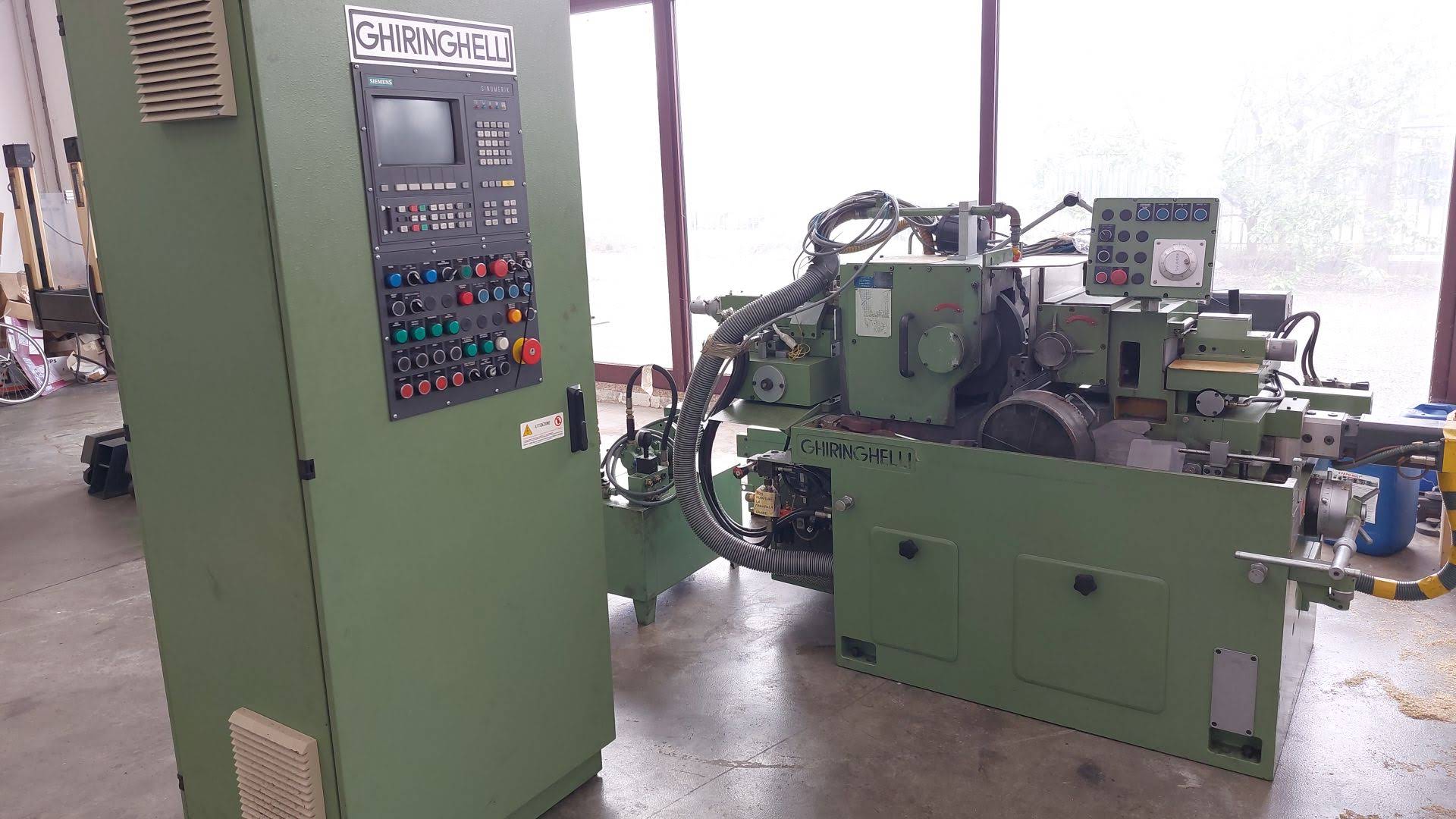 Rectifieuse cylindrique sans centre GHIRINGHELLI M100 CNC 1A révisée