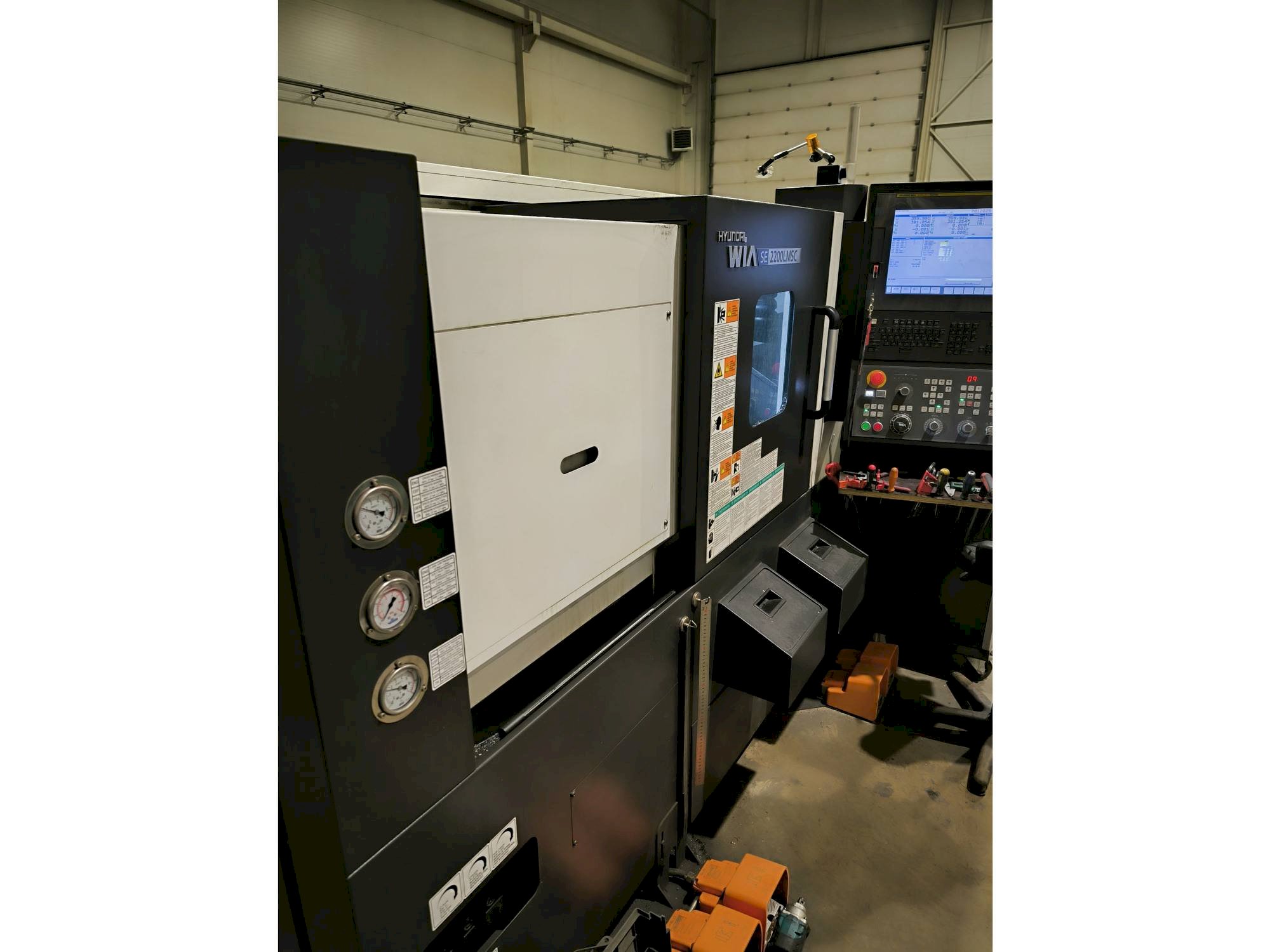 Tour à commande numérique Hyundai Wia SE2200LMSC Faible nombre d'heures