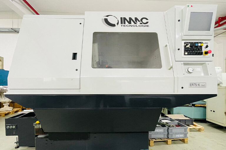 Tour CNC avec ravitailleur de barres IMAC TACN ER 75 X d'occasion