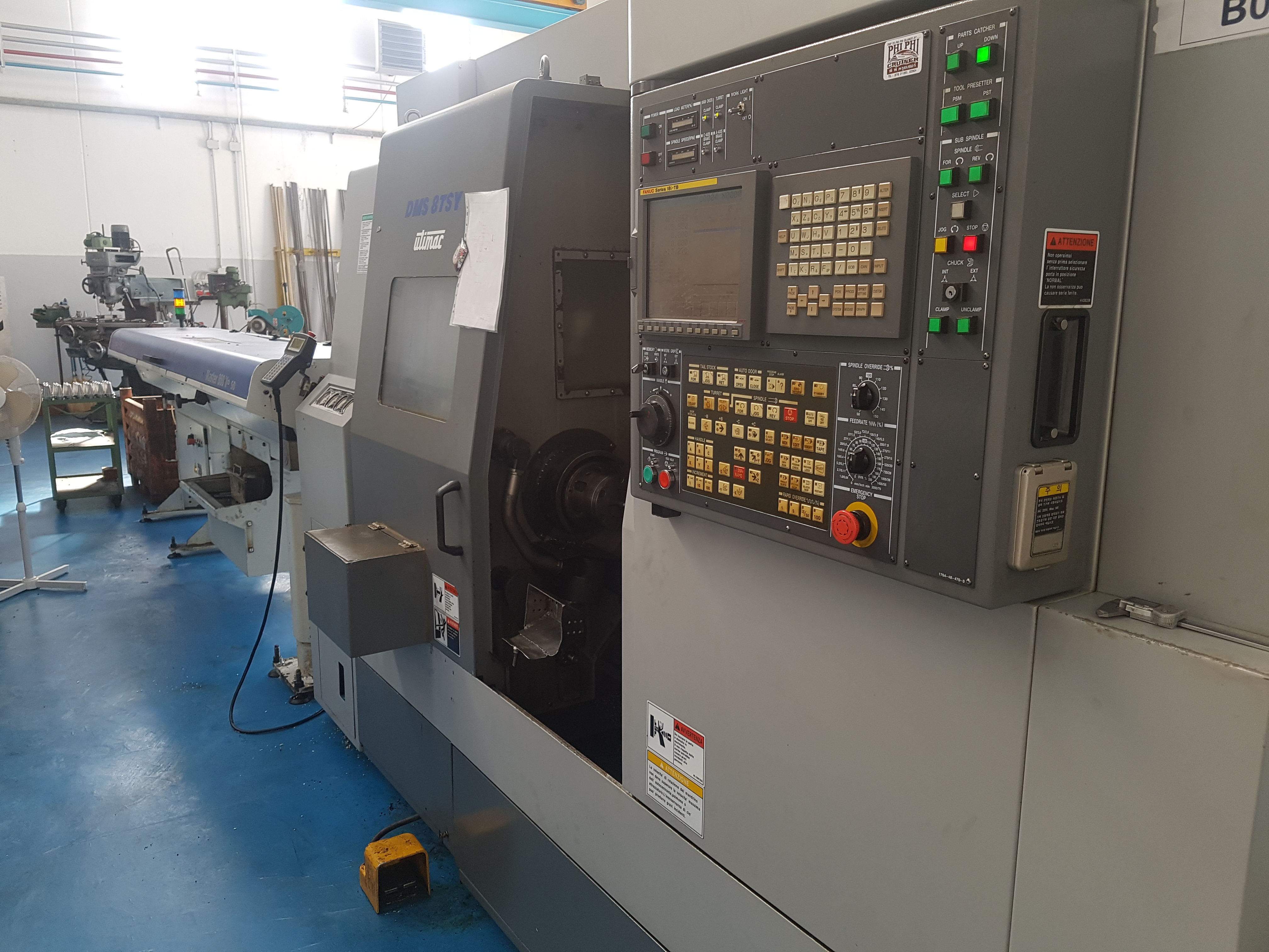 Tour CNC avec ravitailleur de barres DMS 8TSY d'occasion