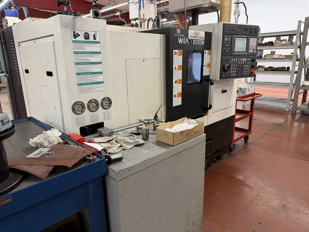 Tour CNC HYUNDAI E 160 Faible nombre d'heures