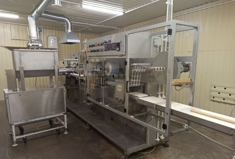 Ligne de formage remplissage operculage Hassia 15/18