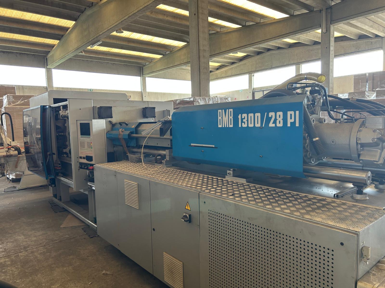 Presse à injecter BMB KW28P/1300 280 TON